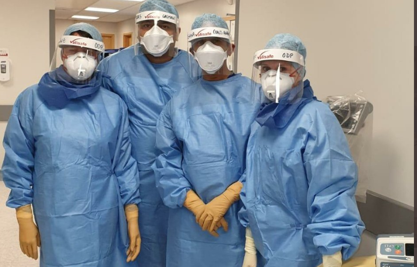medical professionals with ppe gear